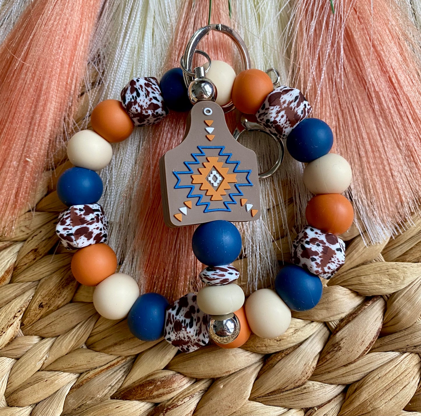 Burnt Orange Cow Tag - Wristlet